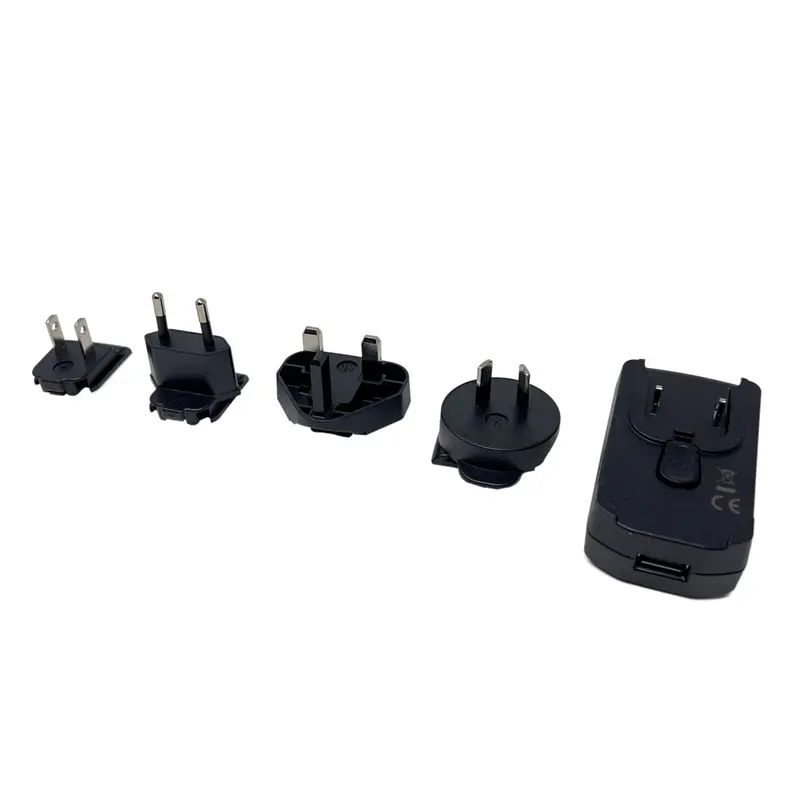 Internationales Code-USB-Netzteil mit Adapterclips für US/EU/UK/AU