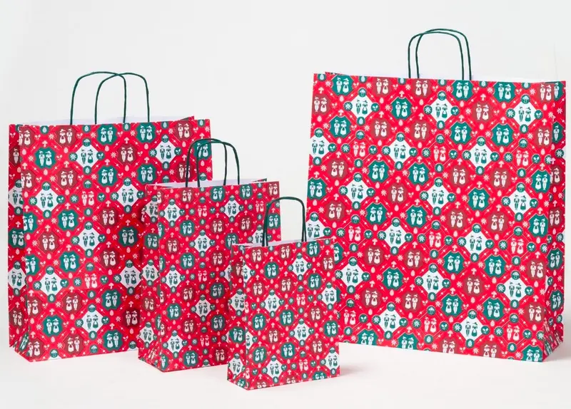 Papierkordeltaschen „Tracht“ – rote Papiertragetaschen mit bayerischem Motiv